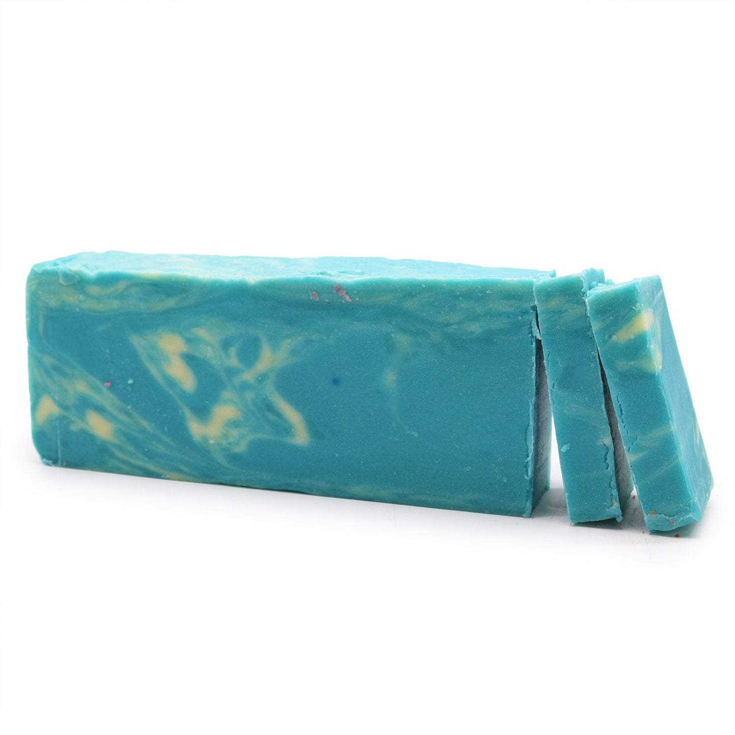 Hand-crafted seaweed olive oil soap loaf with a natural textured green appearance and exfoliating seaweed pieces.