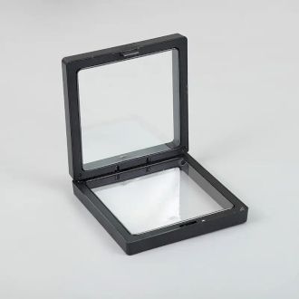 Small black square 3D floating frame display with a transparent membrane showing a levitation effect.