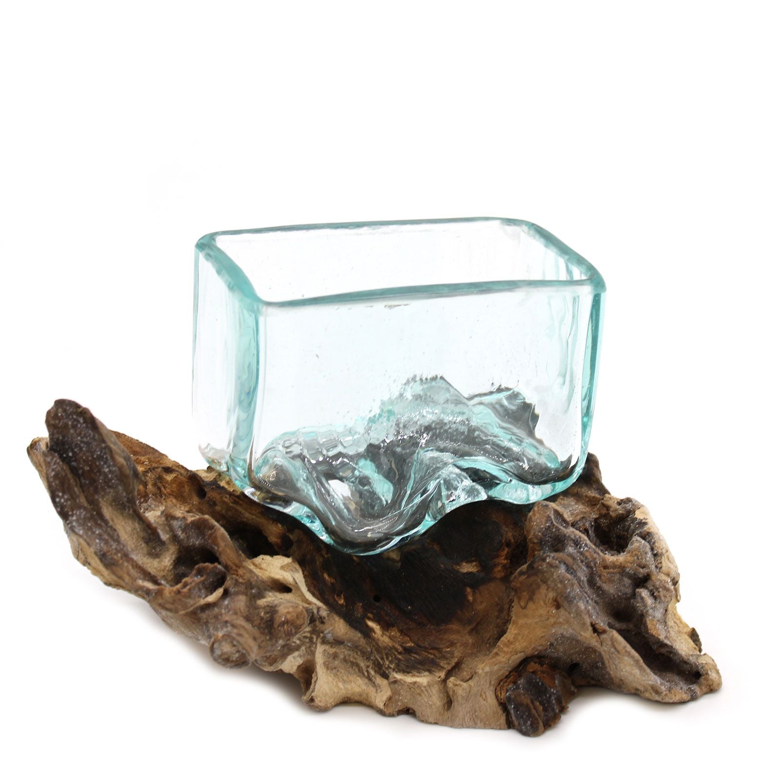Small clear molten glass bowl expertly draped over a natural reclaimed wood root base with a black metal stand.