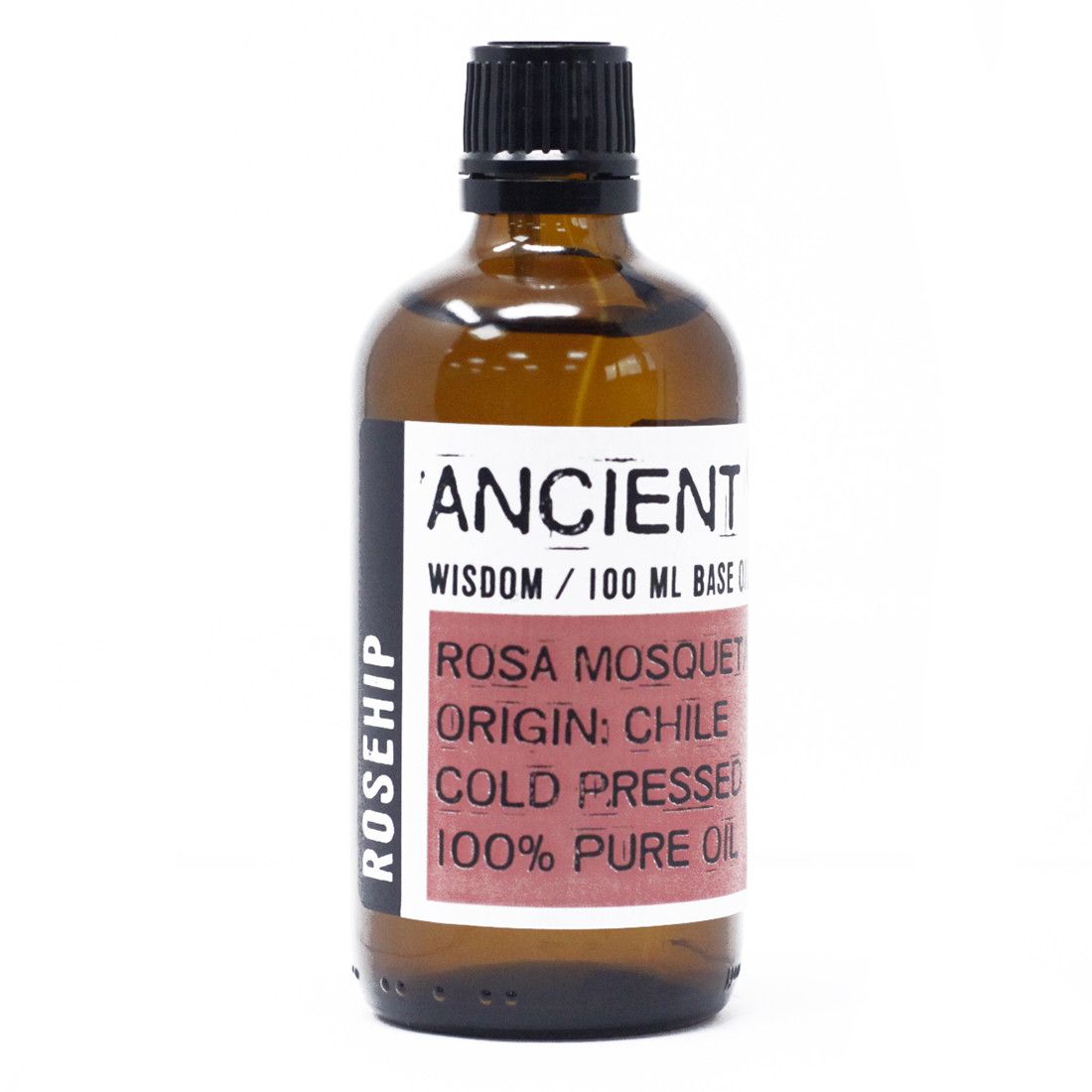 Clear glass bottle of golden rosehip carrier oil showing a natural, viscous texture.