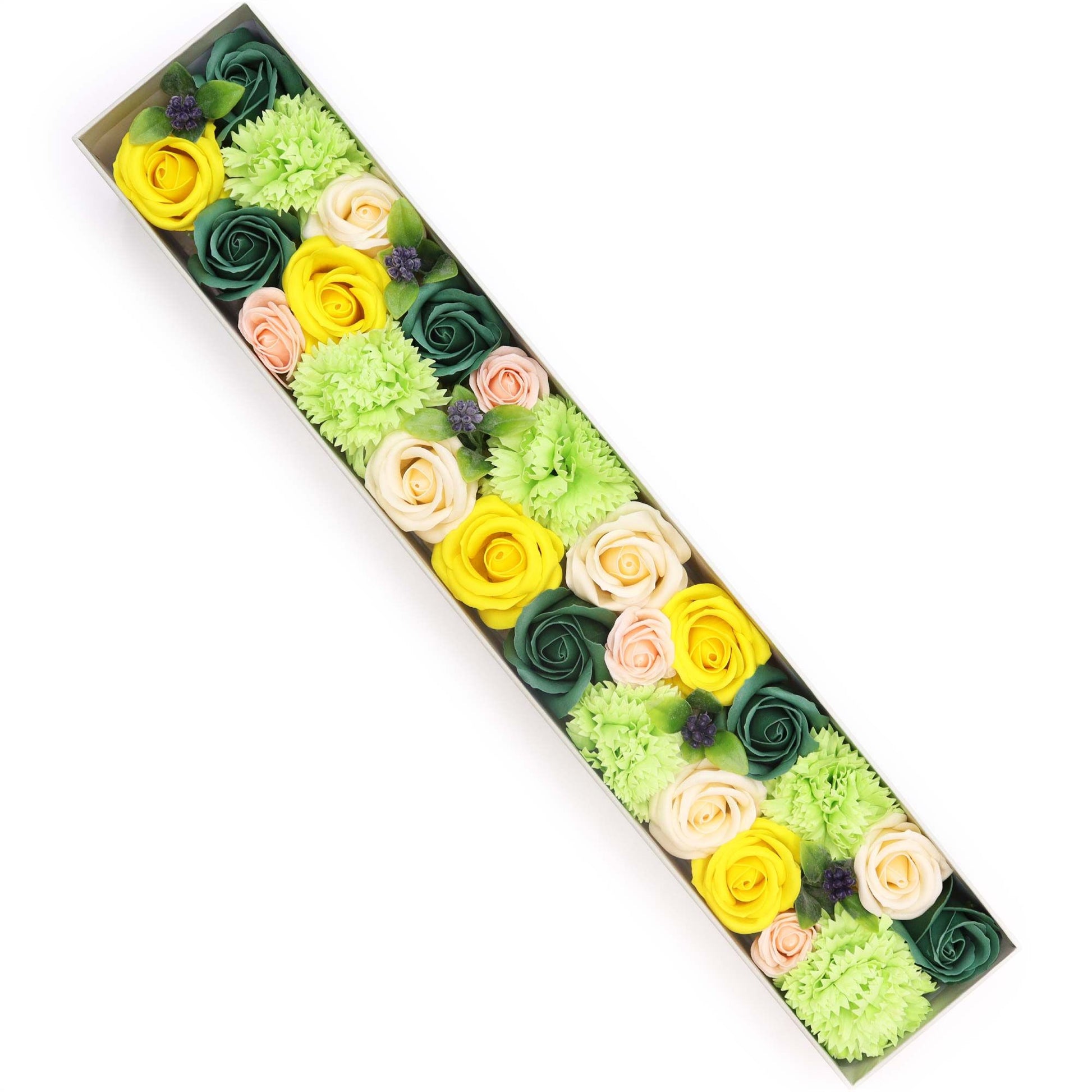 Extra long gift box filled with realistic soap flowers in vibrant yellow and green spring shades.