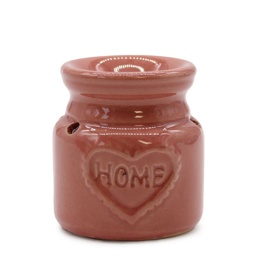 Colourful ceramic oil burner with a decorative home-themed design and a deep bowl for wax melts.