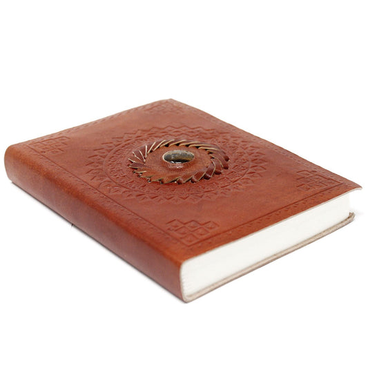 Handcrafted brown leather journal featuring a central tigereye stone inlay, metal clasps, and vintage burnt edges.