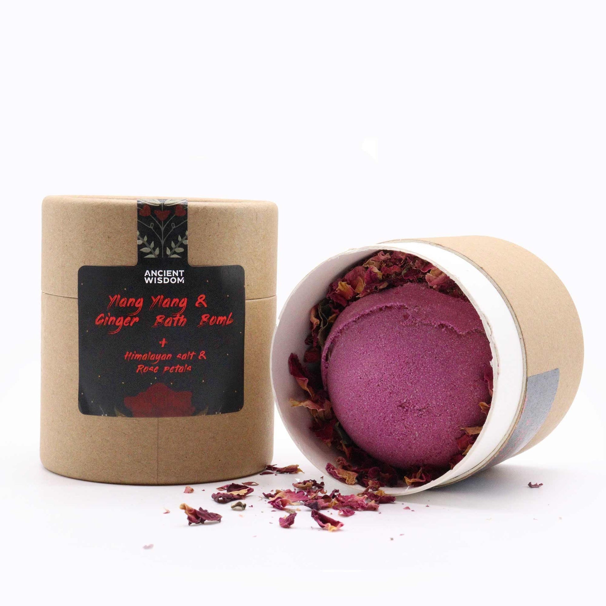 Aromatherapy gift set containing a bath bomb, pink Himalayan salts, and dried rose petals in elegant packaging.