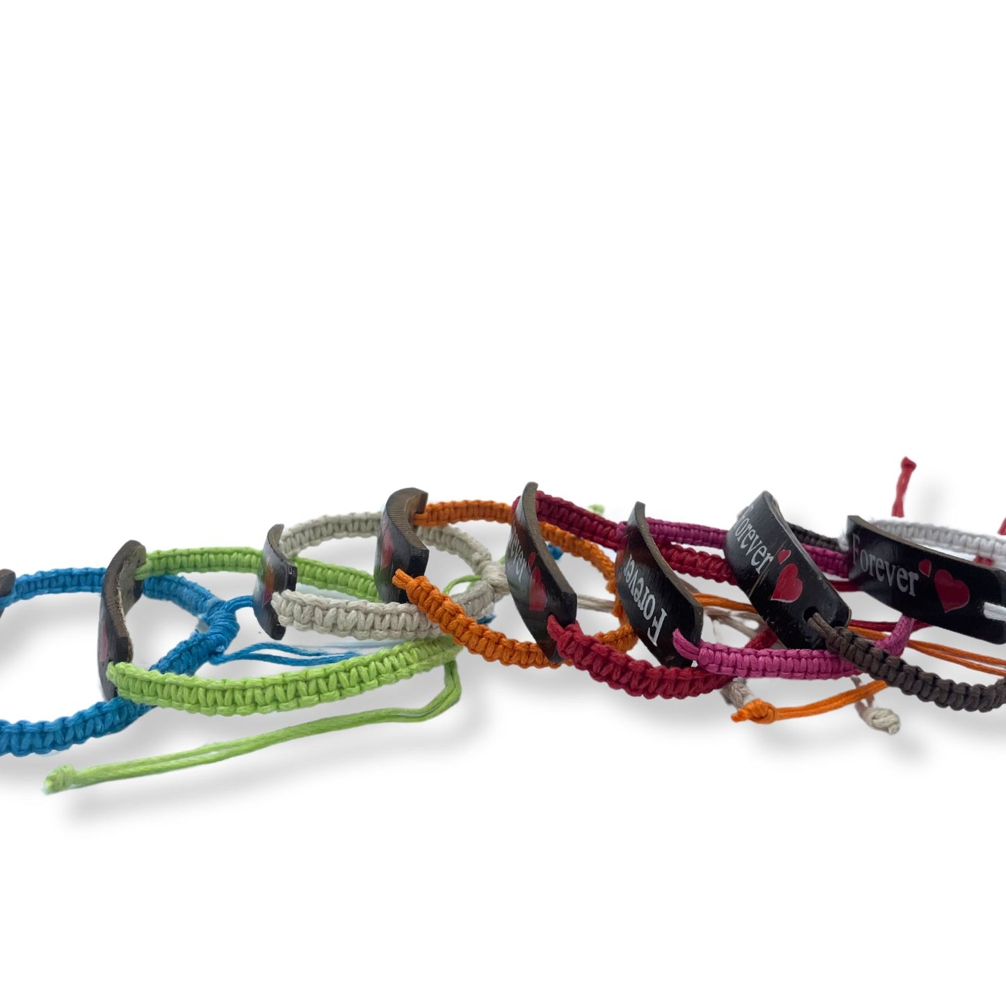 Assorted handmade friendship bracelets crafted from natural coconut shell pieces on adjustable cords.