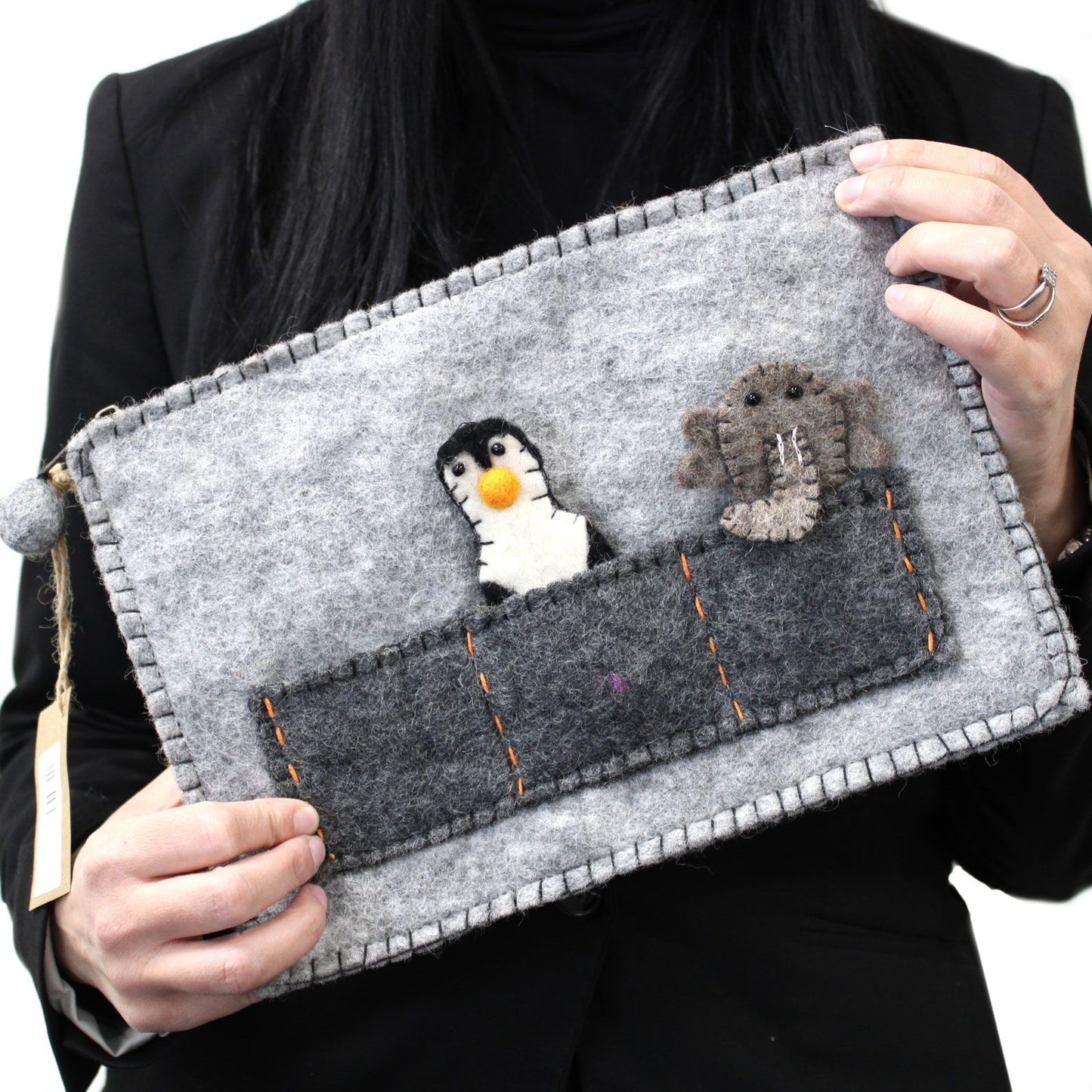 Soft protective tablet pouch with three colourful character finger puppets for interactive play.
