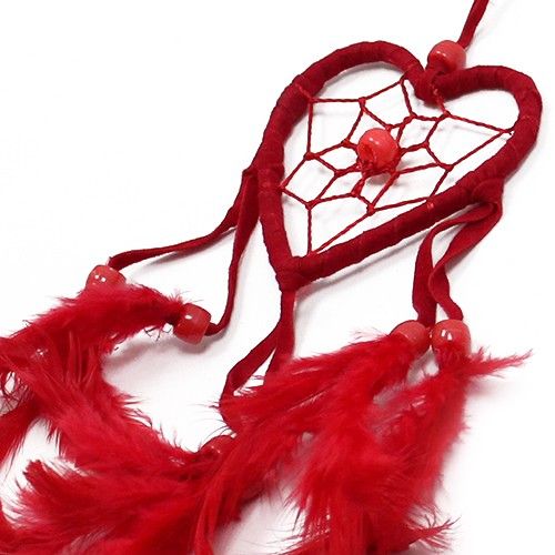 Small heart-shaped dreamcatcher featuring black, white, and red threads with decorative feathers and beads.