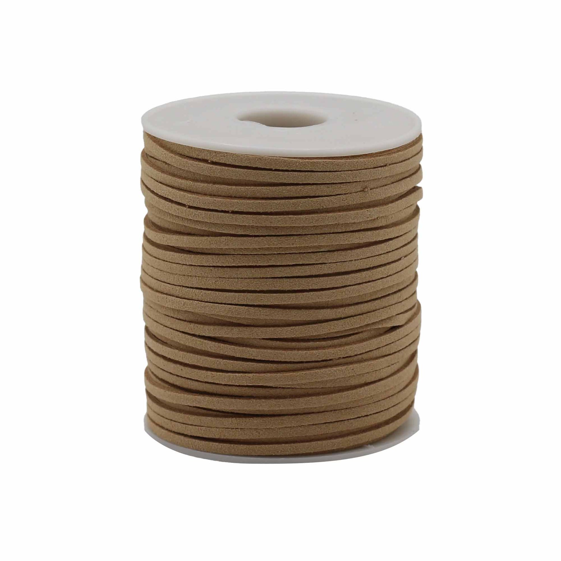 Tan faux suede pendant cord on a bulk roll for jewellery making and spiritual crafting.