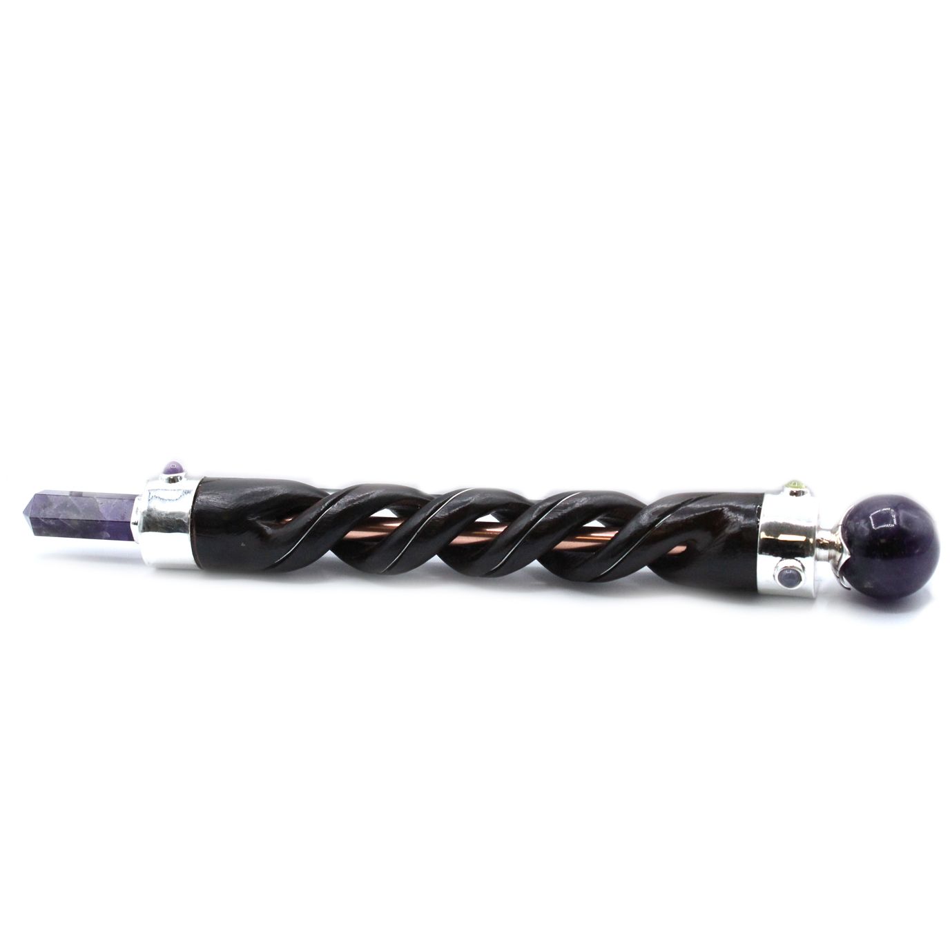 Intricate spiral carved healing wand featuring a purple amethyst crystal tip set in a copper pipe base.