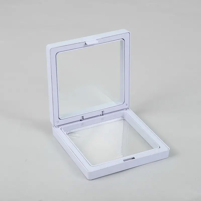 Small white square 3D floating frame display with a transparent membrane for a levitating object effect.