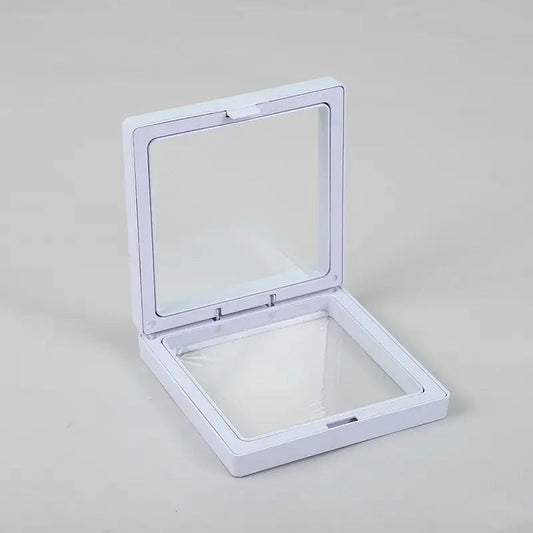 Small white square 3D floating frame display with a transparent membrane for a levitating object effect.