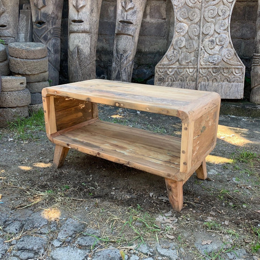 Small round coffee table made from colourful upcycled teak wood with a rustic finish.