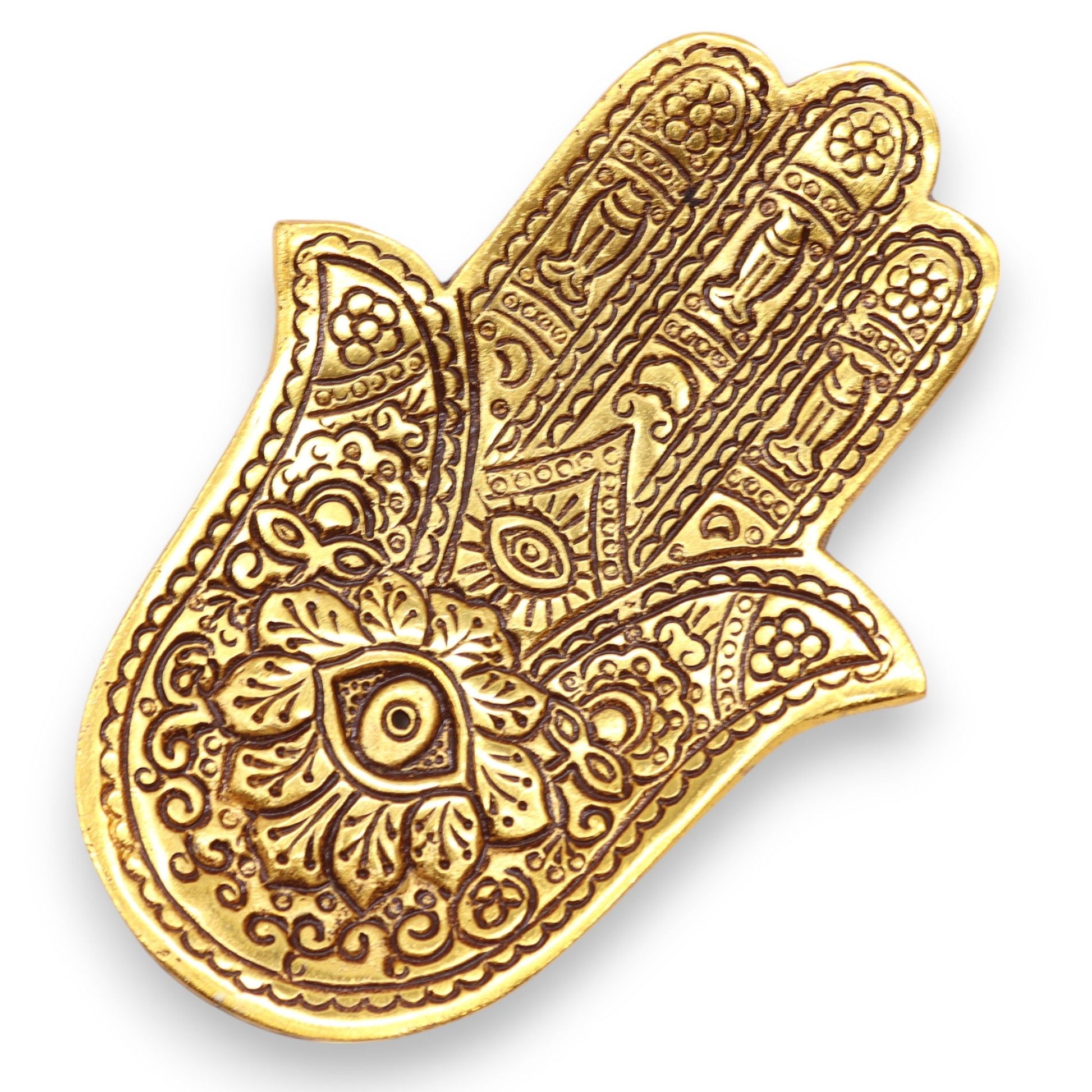 Small gold polished aluminium incense holder in the shape of a Hamsa hand with intricate decorative patterns.