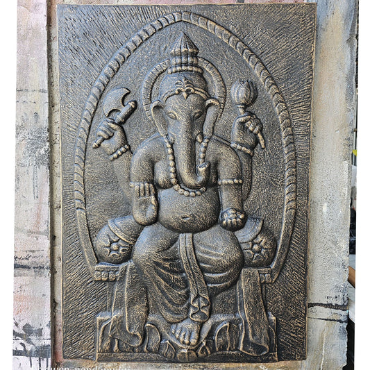 Large iron frame wall hanging featuring a detailed Ganpati deity in an antique gold relief finish.