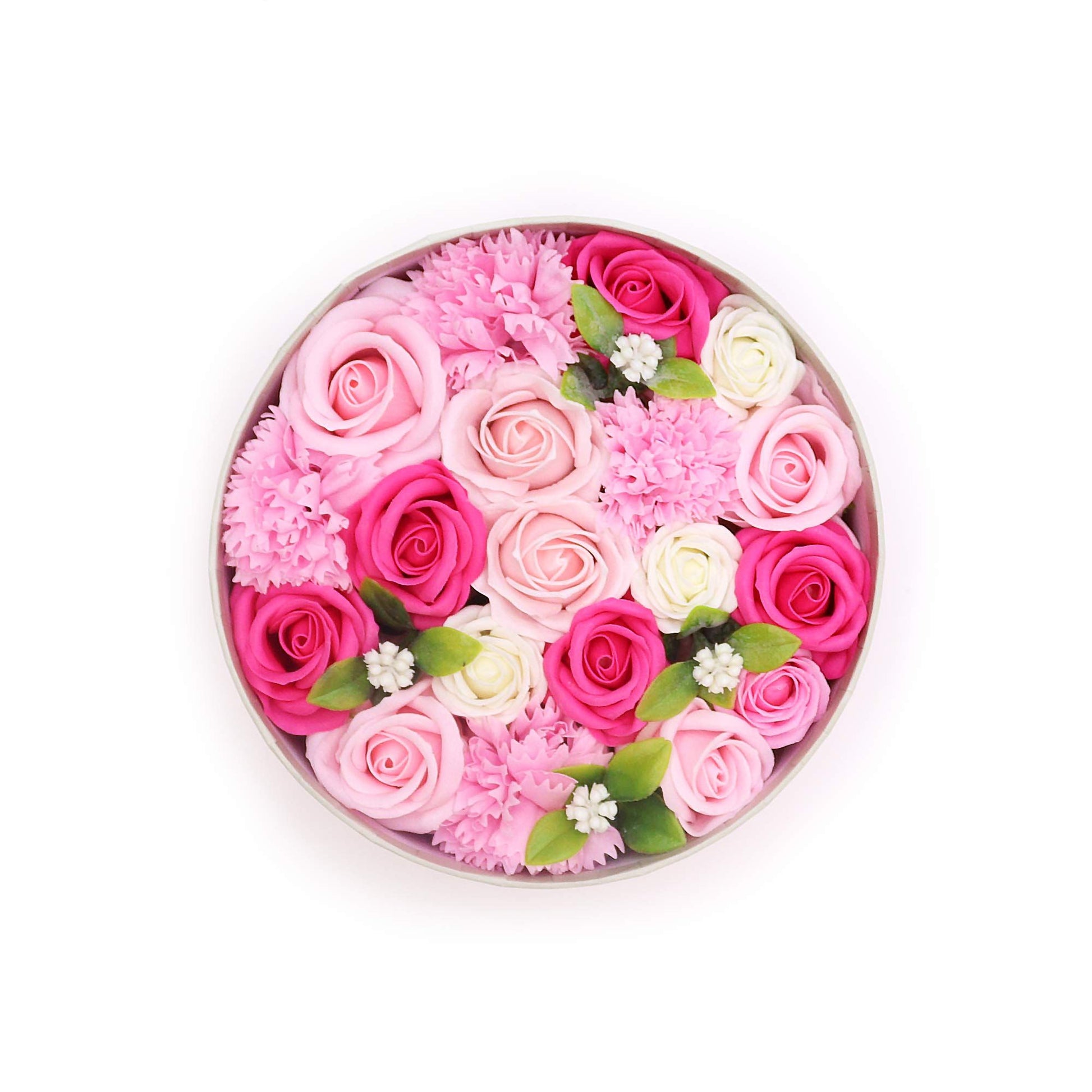 Handcrafted pink soap flowers arranged in a round gift box with delicate petals and elegant design.