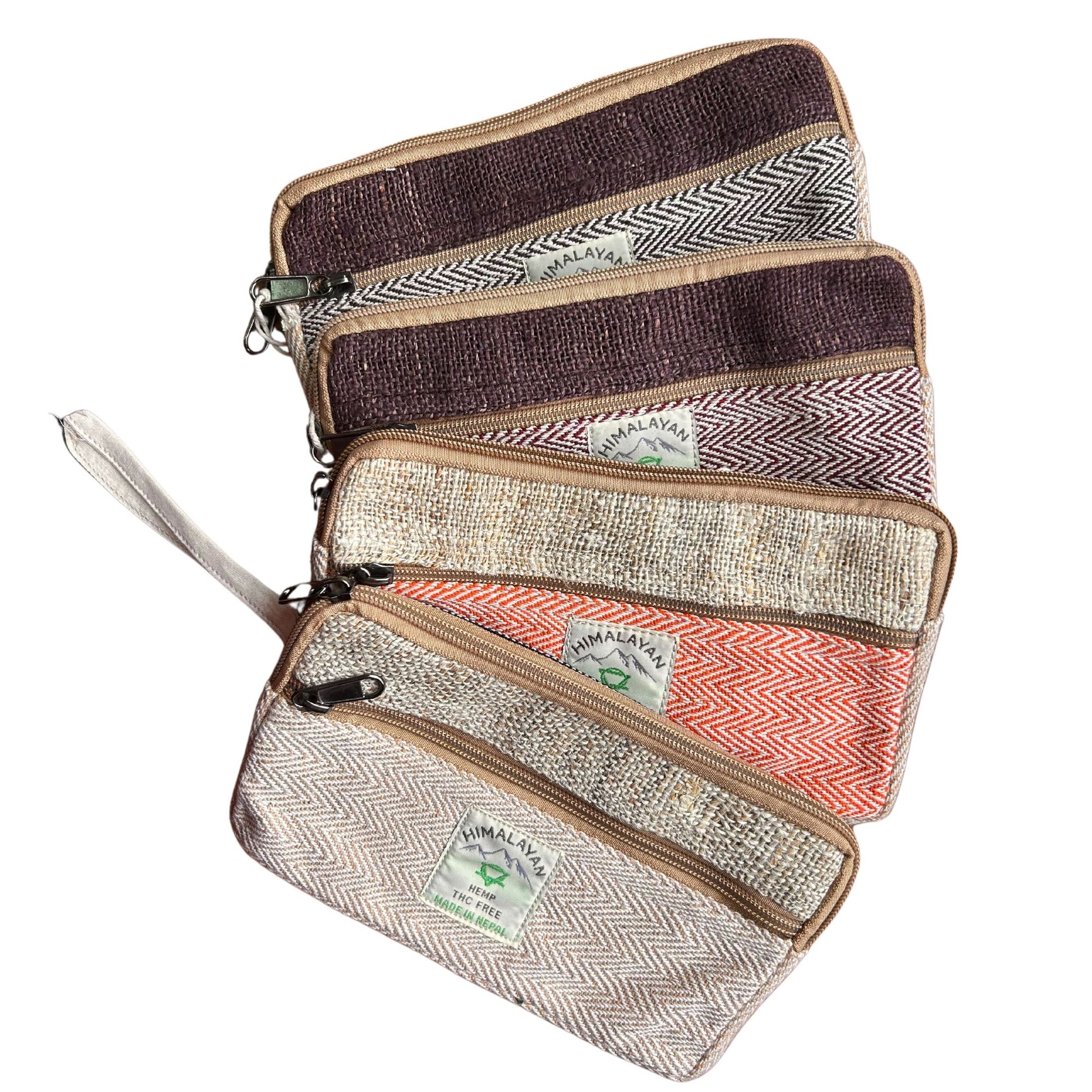 Small handmade hemp zip pouch with colorful woven patterns and a secure zipper closure.