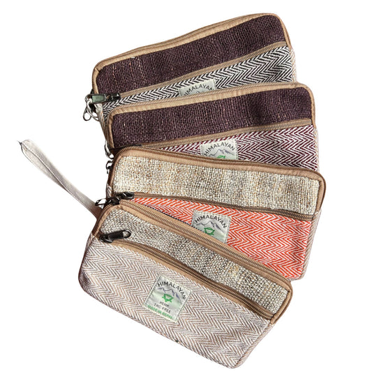 Small handmade hemp zip pouch with colorful woven patterns and a secure zipper closure.