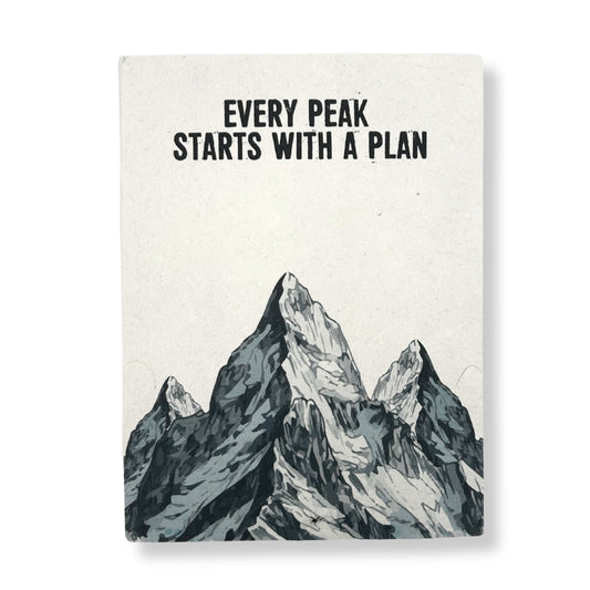 Large handmade lokta paper notebook featuring a minimalist mountain peak design and a matching bookmark.