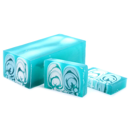 Large artisanal handcrafted soap loaf with a creamy white texture and a fresh cotton scent.