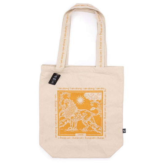 Cotton tote bag featuring a majestic lion tarot card design and the empowering affirmation I Am Strong.