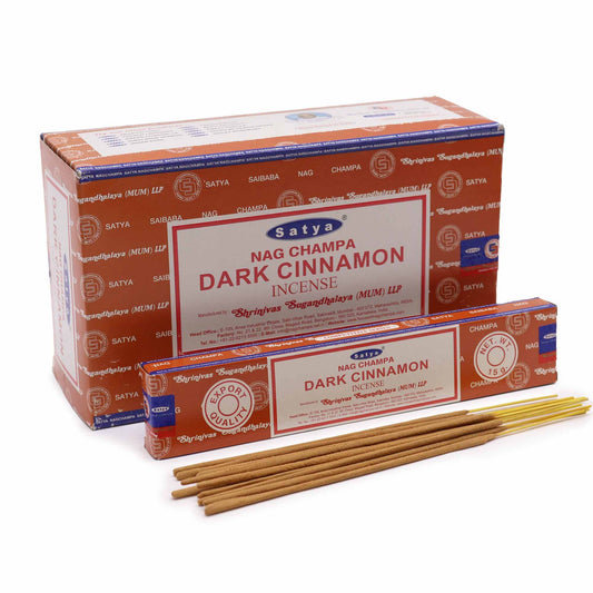 Hand-rolled dark cinnamon incense sticks in a 15g blue and white packet on a neutral background.