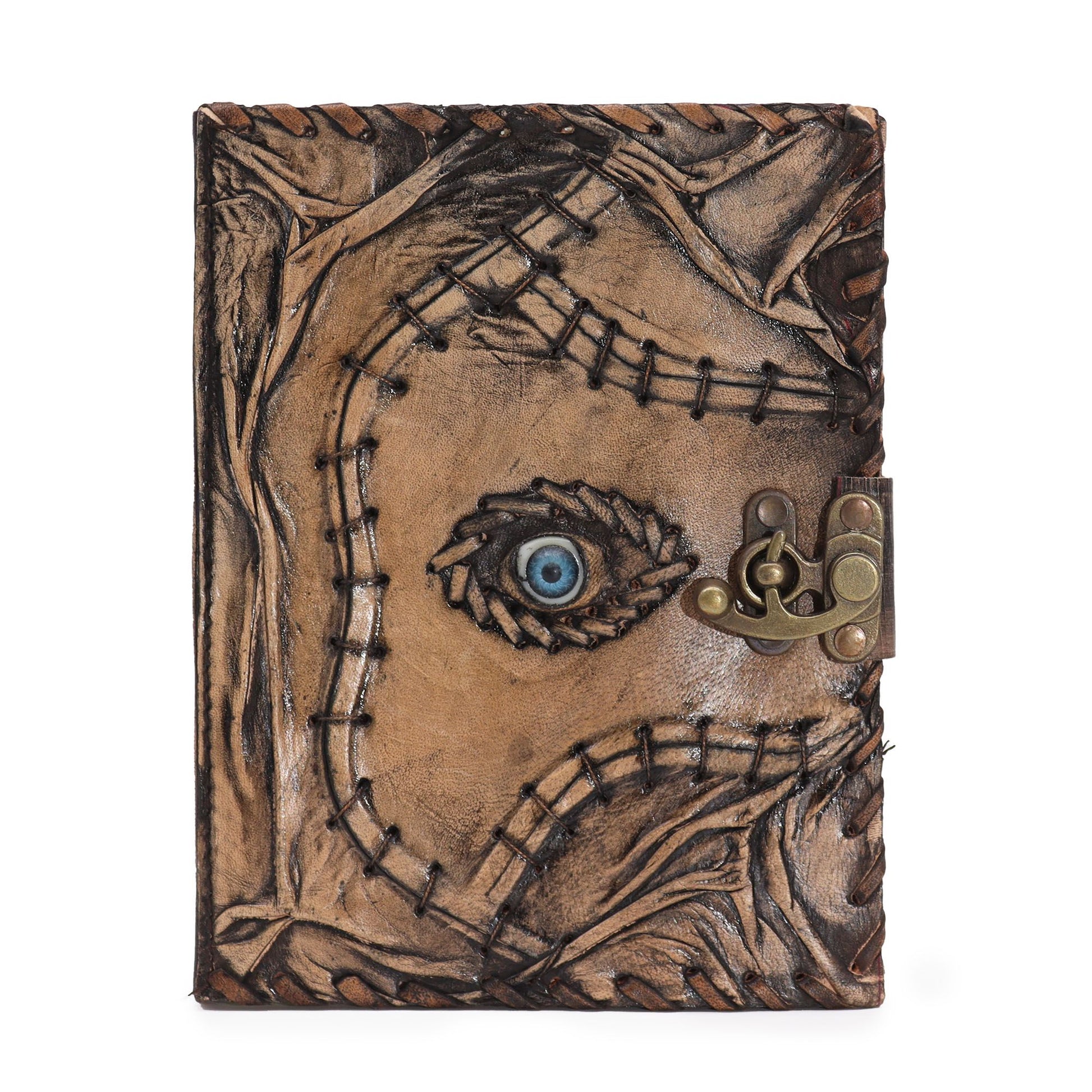 Tan leather notebook with an embossed evil eye design and rustic deckle-edged paper pages.