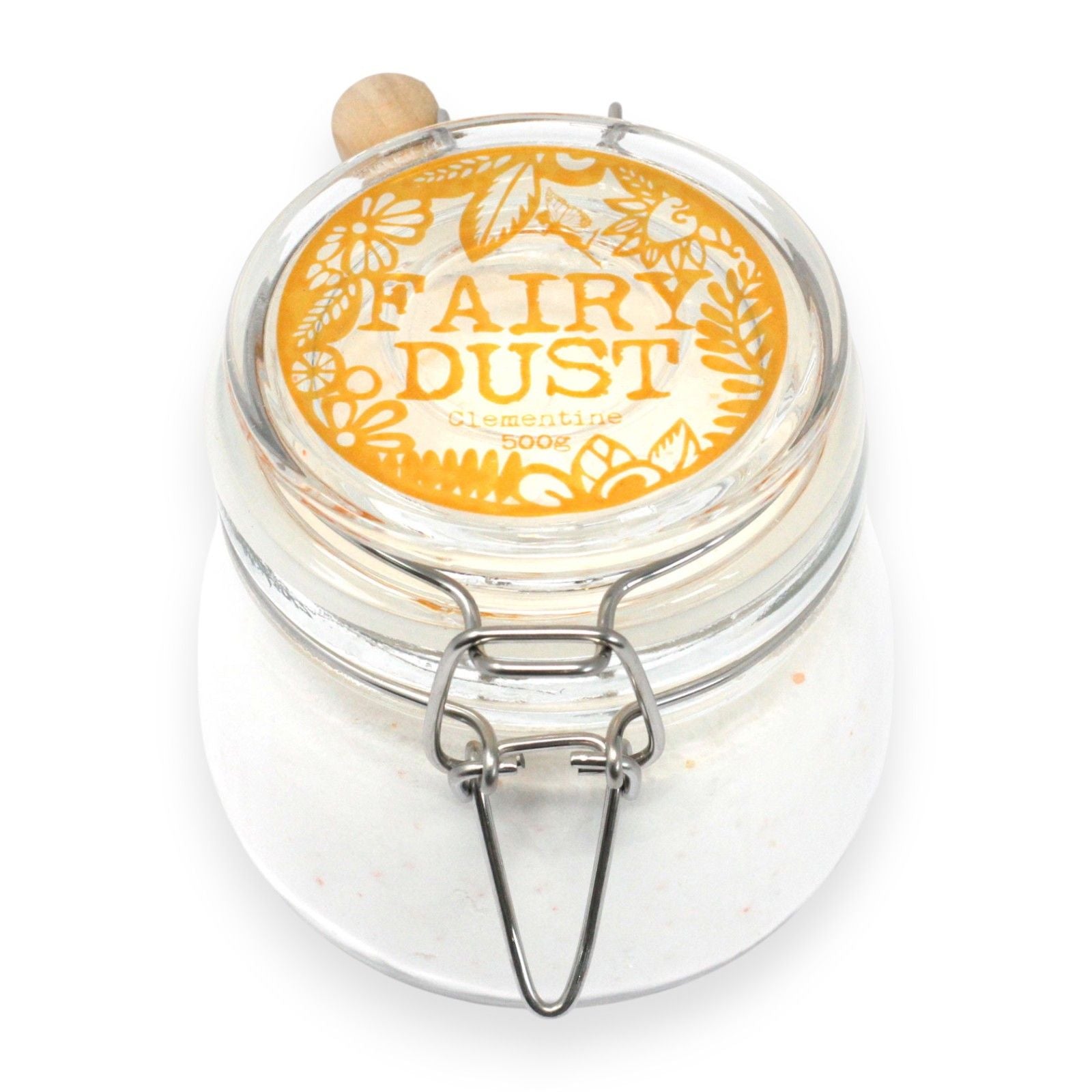 Fine orange-tinted bath powder in a large glass jar, evoking a refreshing citrus scent.