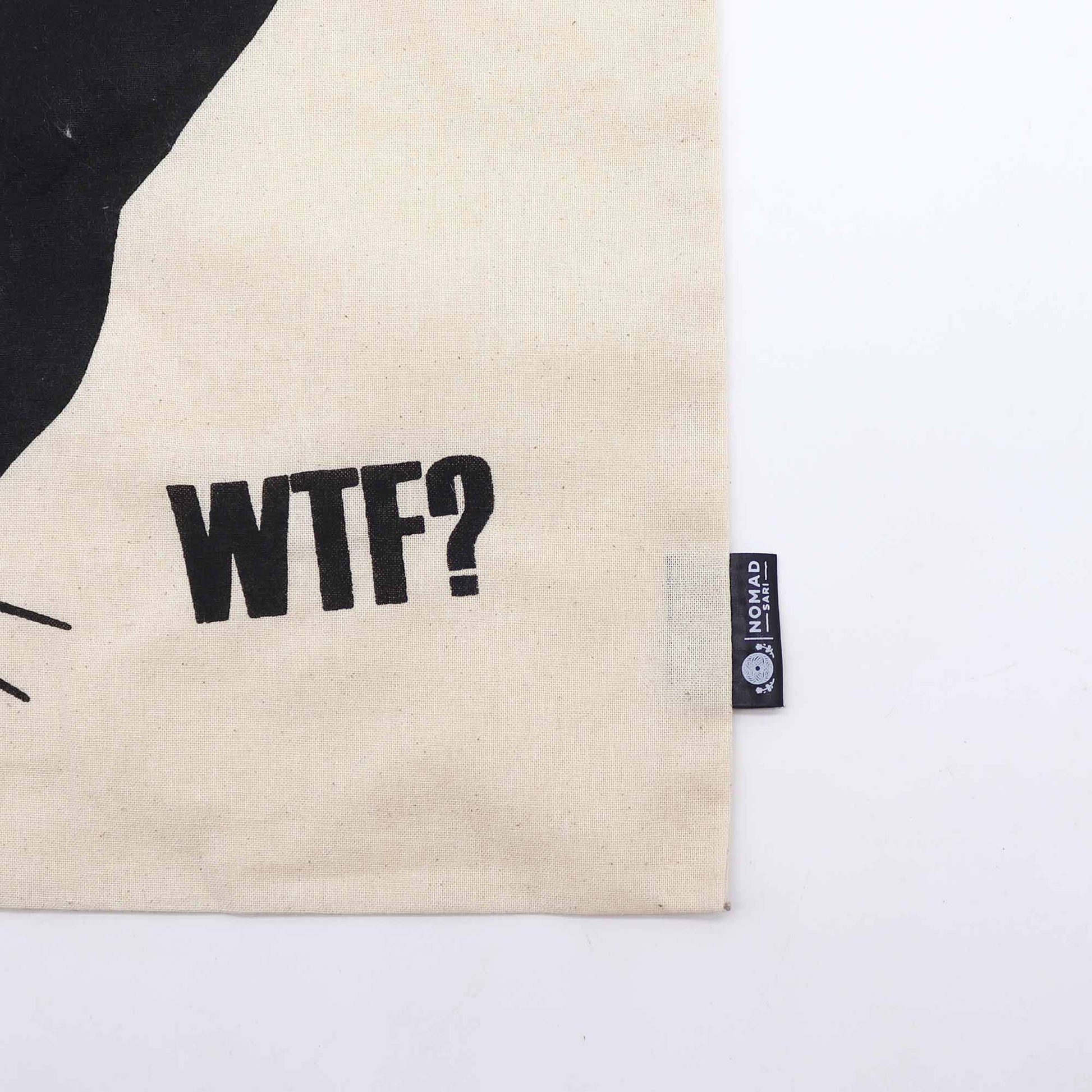 Natural cotton tote bag featuring a minimalist black cat illustration.
