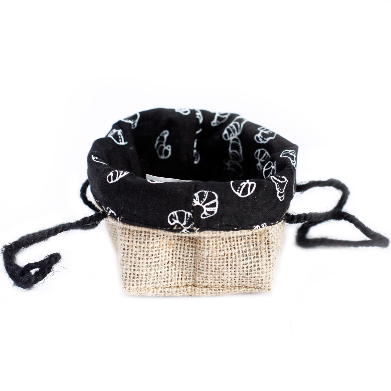 Small natural jute gift bag with a black cotton lining and sturdy woven handles on a plain background.