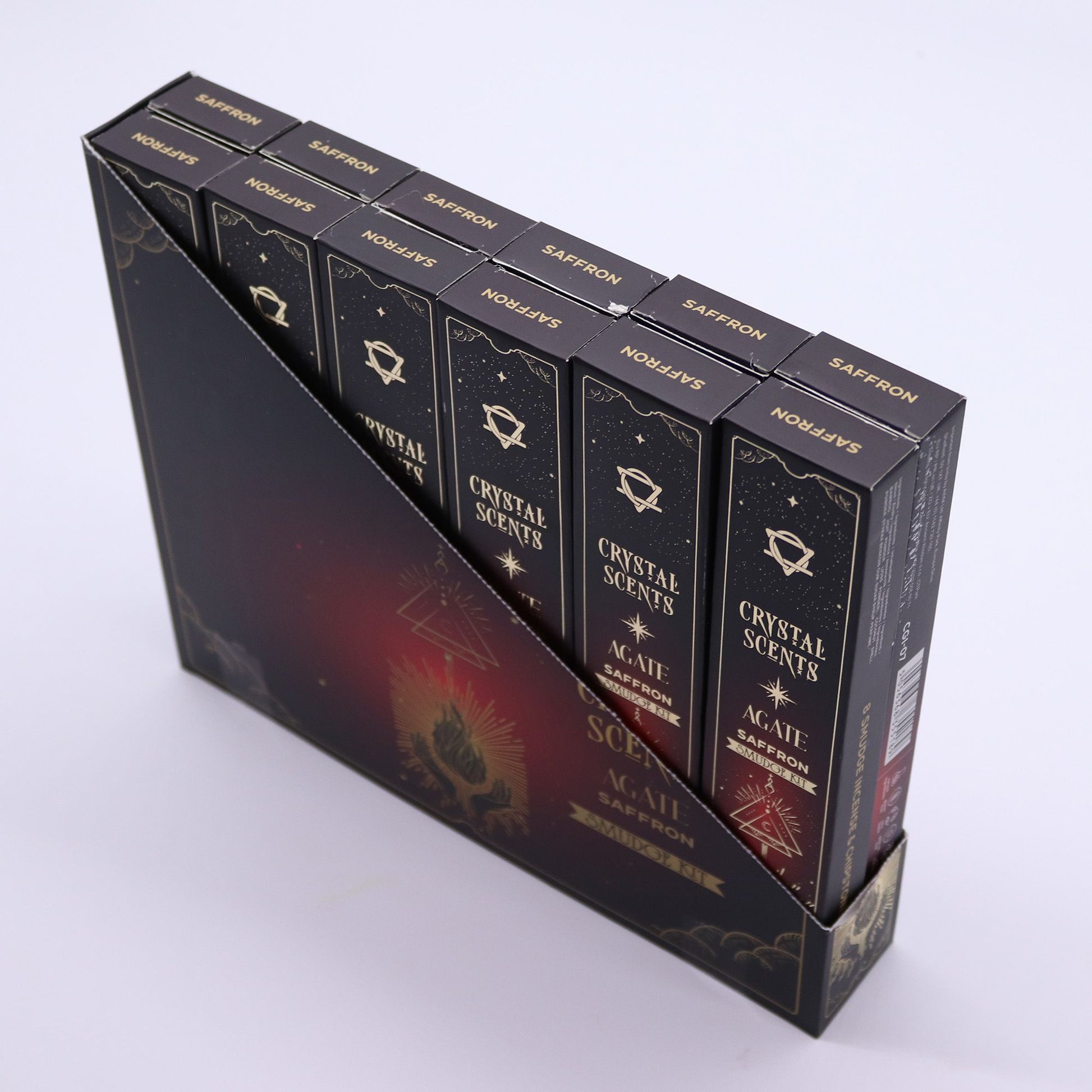 Handcrafted saffron incense sticks decorated with small red agate crystal stones in a professional presentation box.