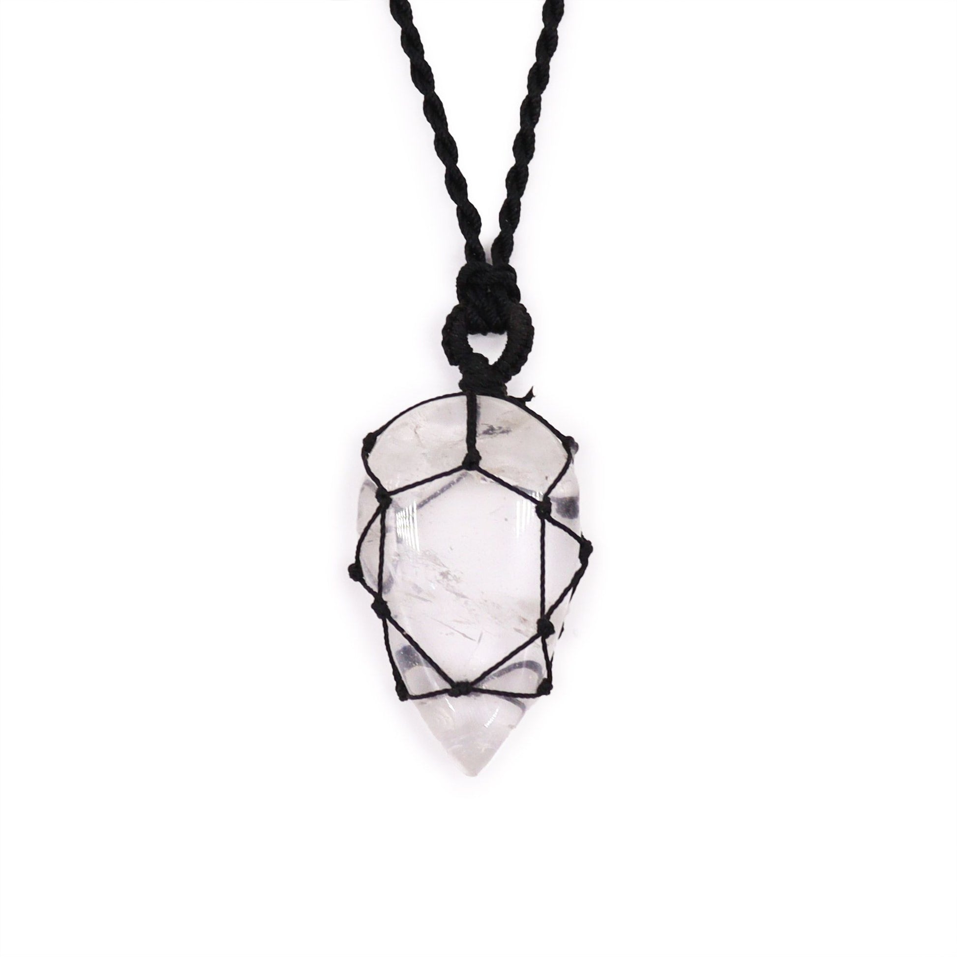 Elegant teardrop-shaped clear rock quartz gemstone pendant with intricate silver-style laced metalwork detail.