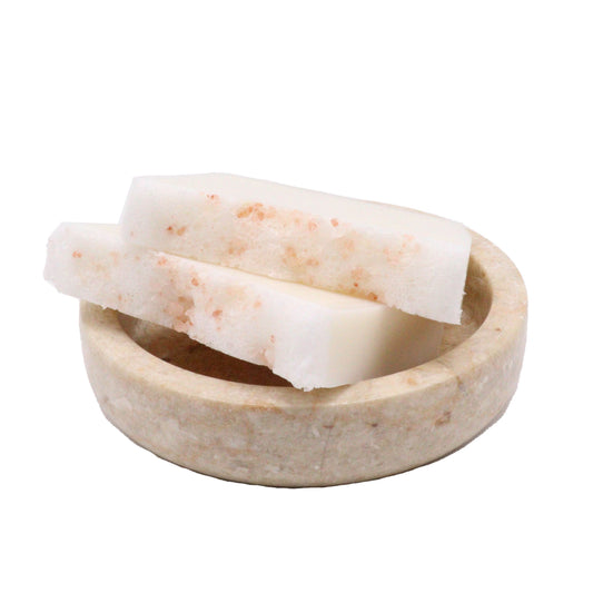 Hand-crafted white soap bar with a whipped top texture sprinkled with pink Himalayan salt crystals.