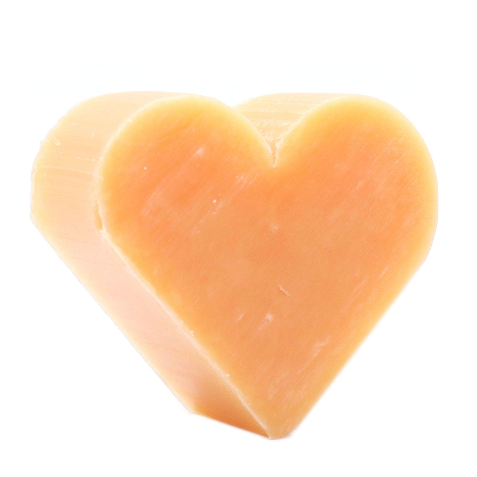 Set of ten vibrant orange heart-shaped guest soaps with a smooth finish on a neutral background.