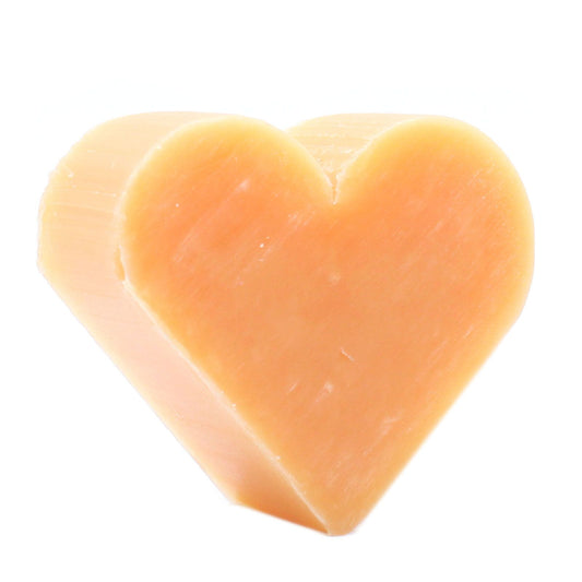 Set of ten vibrant orange heart-shaped guest soaps with a smooth finish on a neutral background.