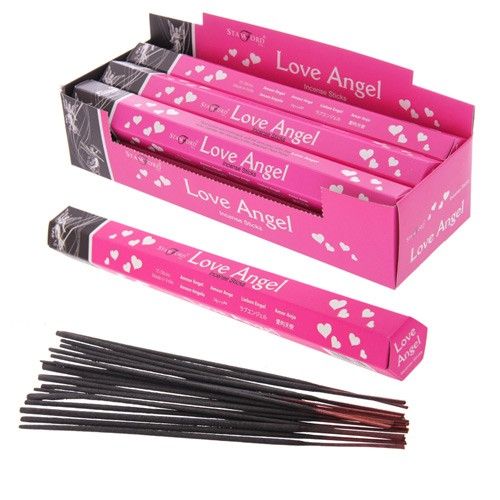 A pack of pink incense sticks with angelic imagery on the box, perfect for creating a romantic mood.