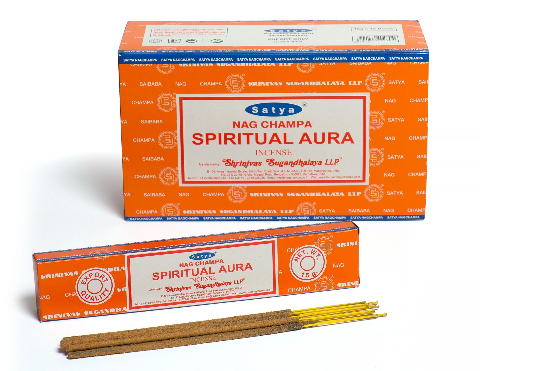 Packet of hand-rolled spiritual aura incense sticks on a wooden surface with aromatic smoke.