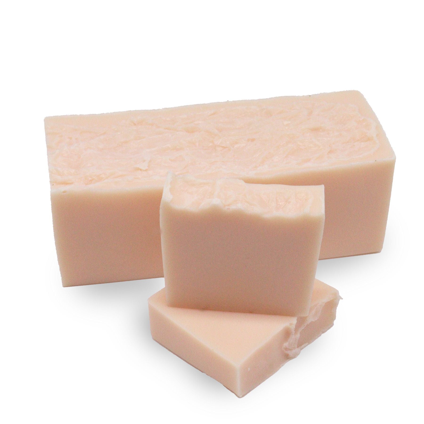 Large rectangular hand-crafted soap loaf with a vibrant peach and white marbled design and textured top.