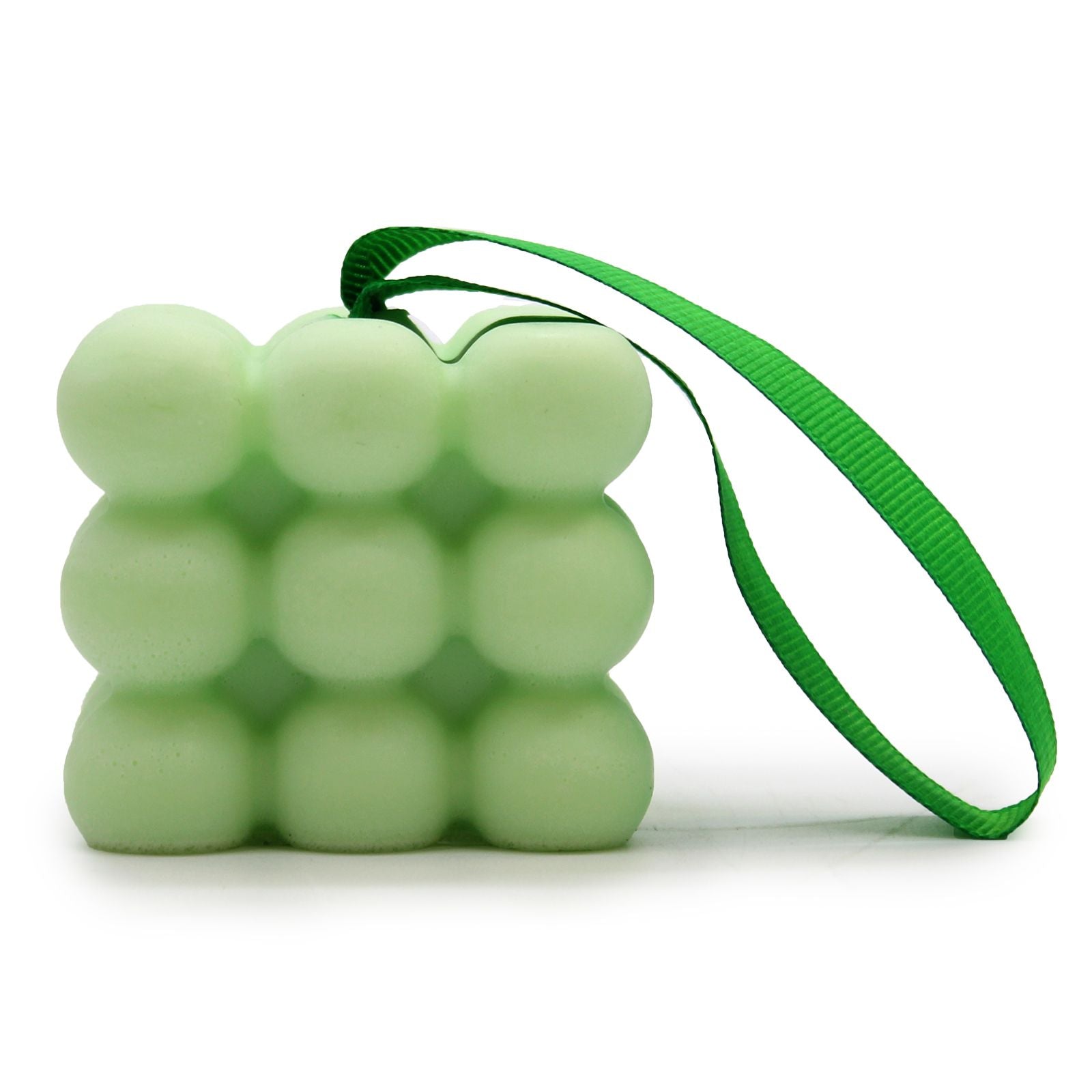 A textured green massage soap bar with built-in nodules for muscle stimulation.