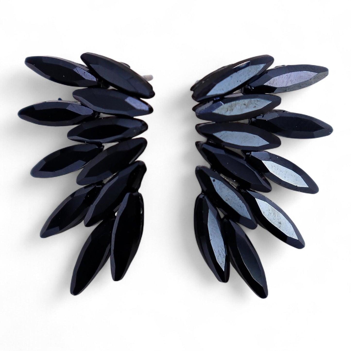 Elegant jet black vintage glass earrings with a delicate fairy design and stainless steel hooks.