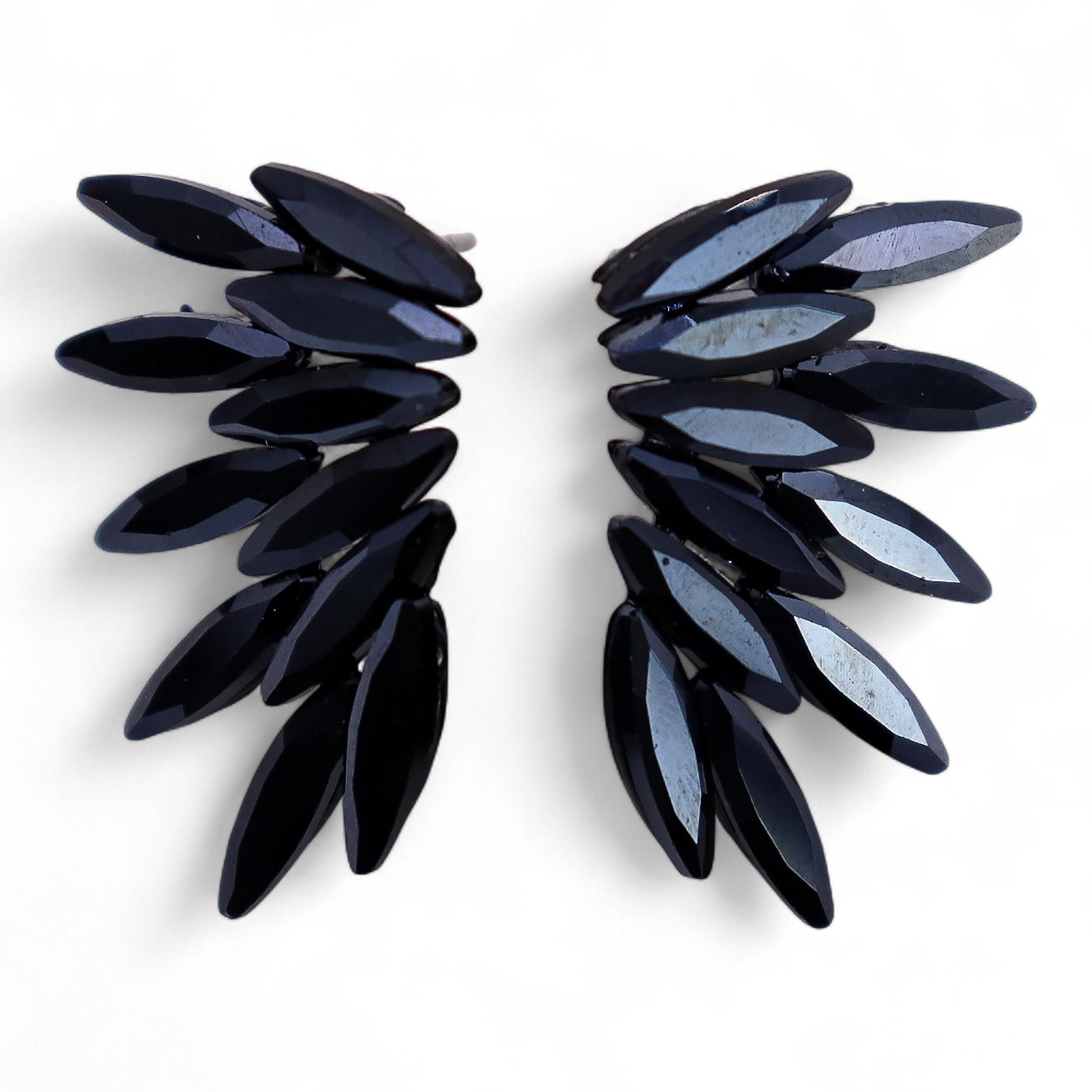 Elegant jet black vintage glass earrings with a delicate fairy design and stainless steel hooks.