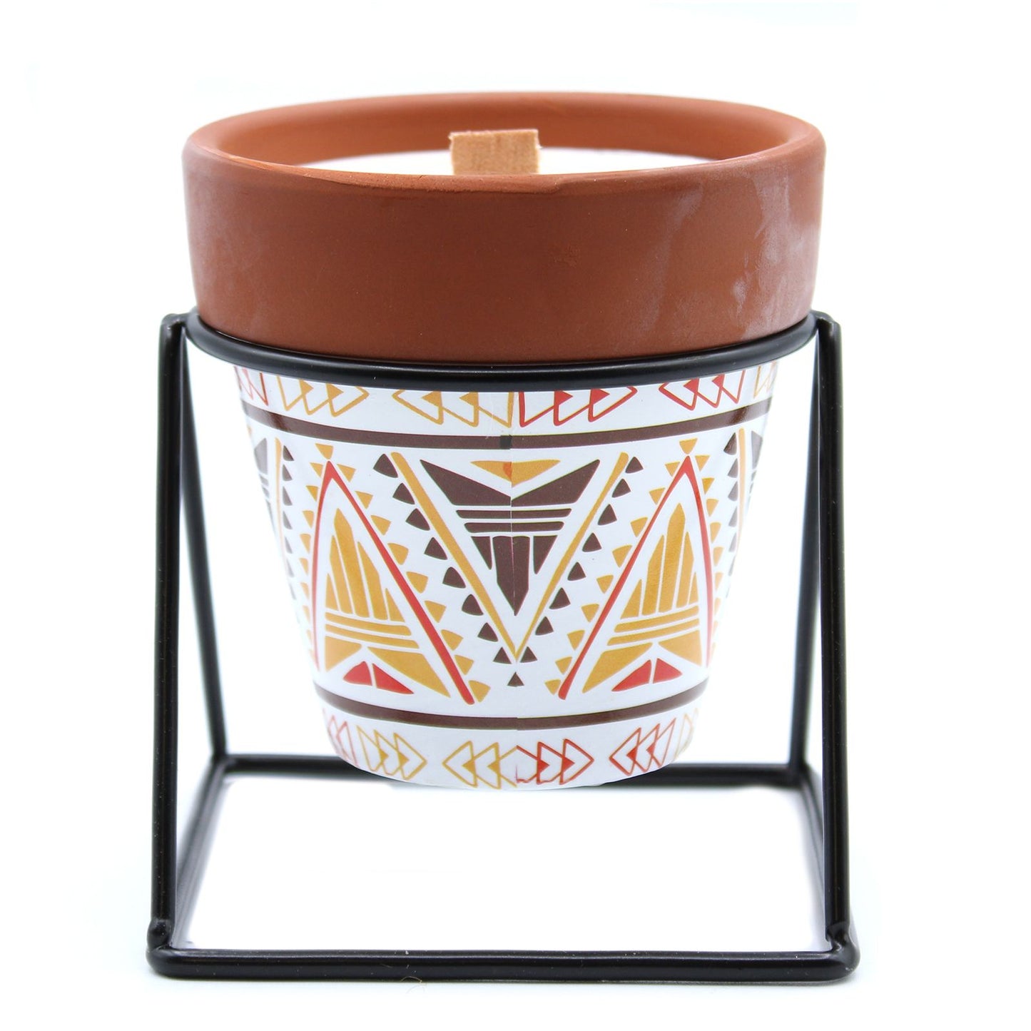Earthy sage green herb garden candle in a rustic plant-pot style ceramic holder on a matching mini saucer.