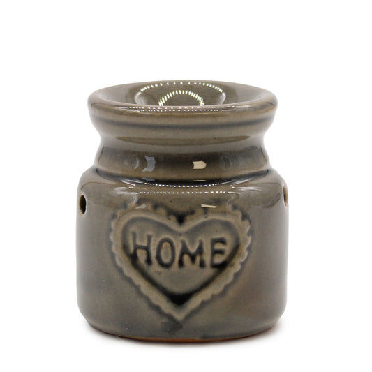 Colourful ceramic oil burner with a decorative home design, suitable for wax melts and fragrance oils.