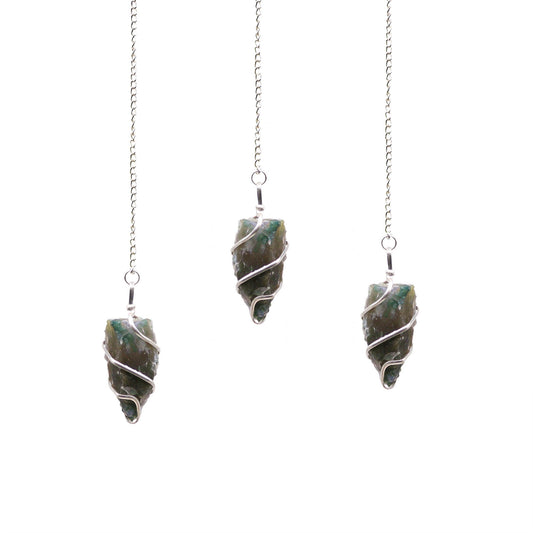 Natural unpolished moss agate crystal pendulum with green dendritic inclusions on a silver-coloured chain.