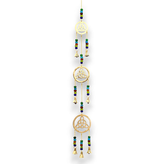 Elegant brass wind chime featuring a Celtic drop design and seven small bells hanging in a vertical row.