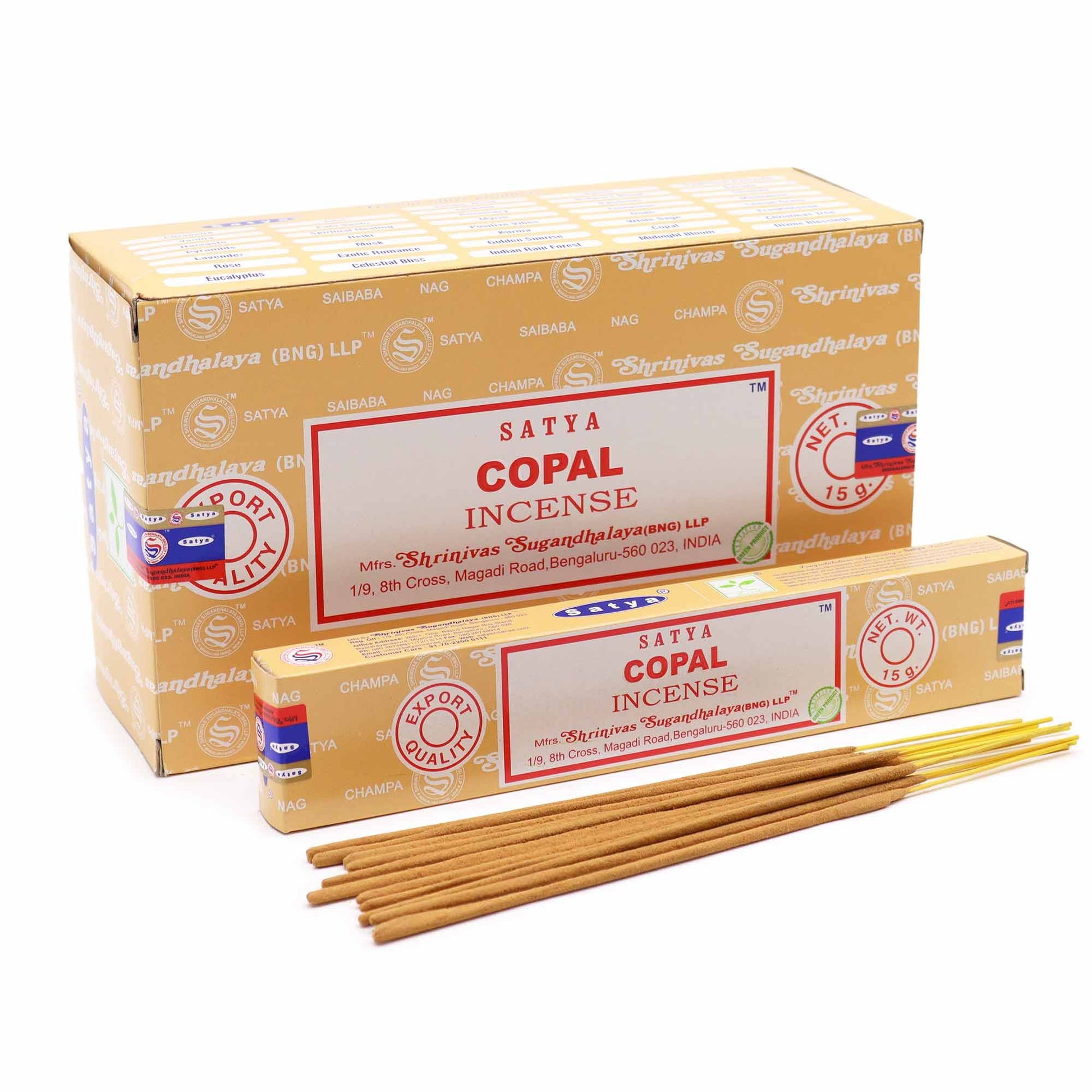 Hand-rolled incense sticks with a natural finish, releasing a delicate stream of aromatic smoke.