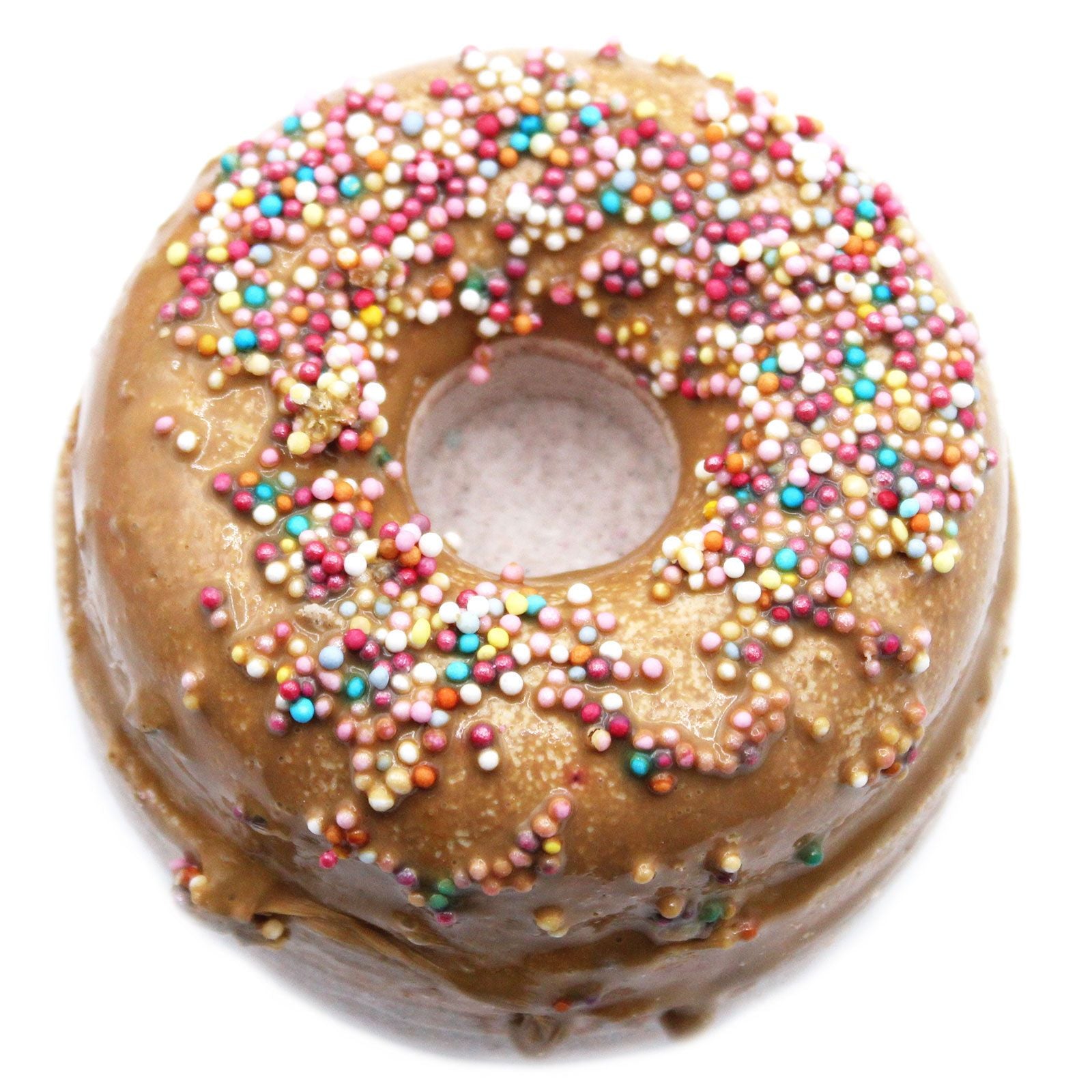Two realistic donut-shaped bath fizzers with toffee-coloured glaze and caramel-style decorations on a neutral background.