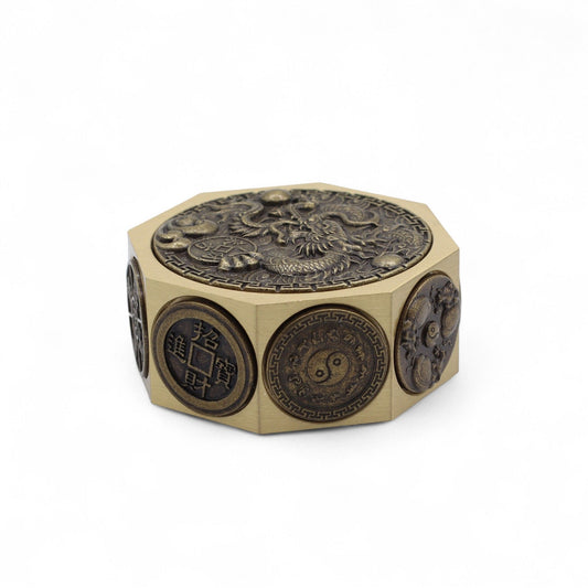 Detailed metal spinning coin featuring a traditional Chinese dragon and lucky cat design for protection and prosperity.