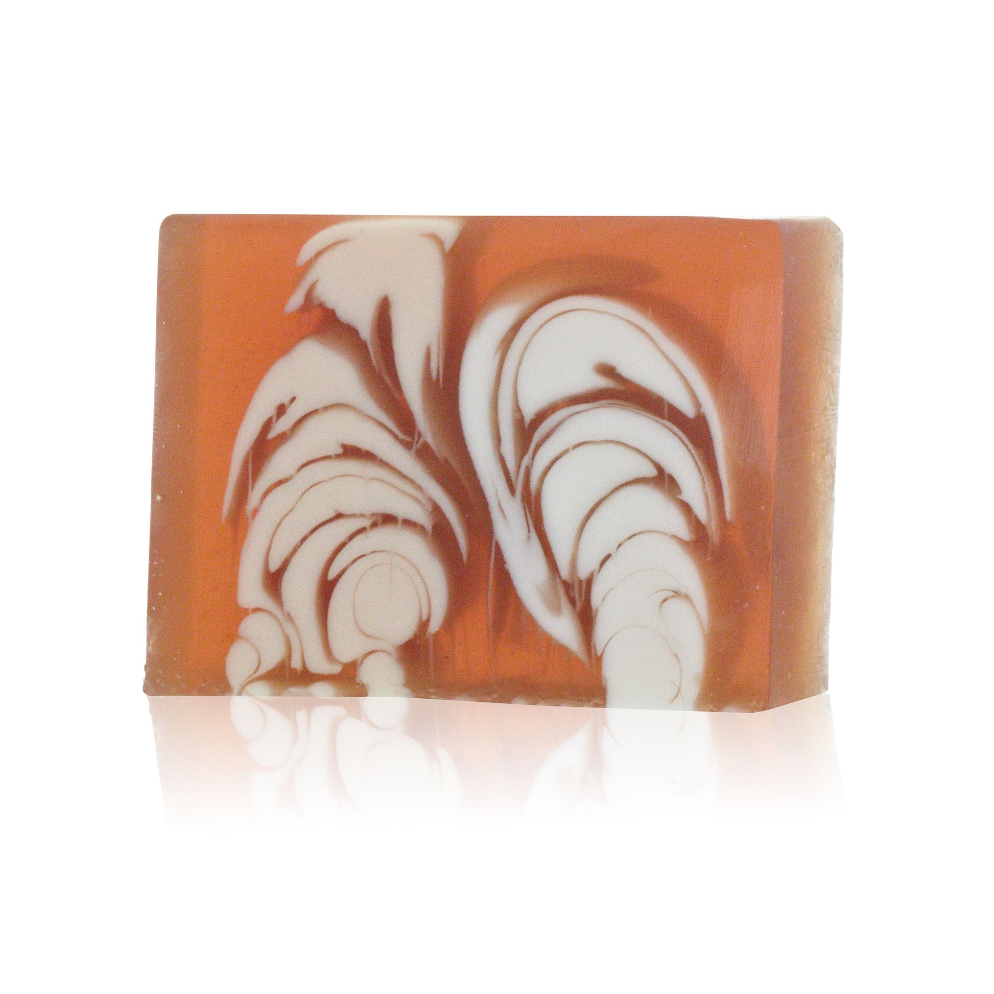 A thick slice of artisanal handcrafted soap with a creamy texture and natural almond-inspired aesthetic.