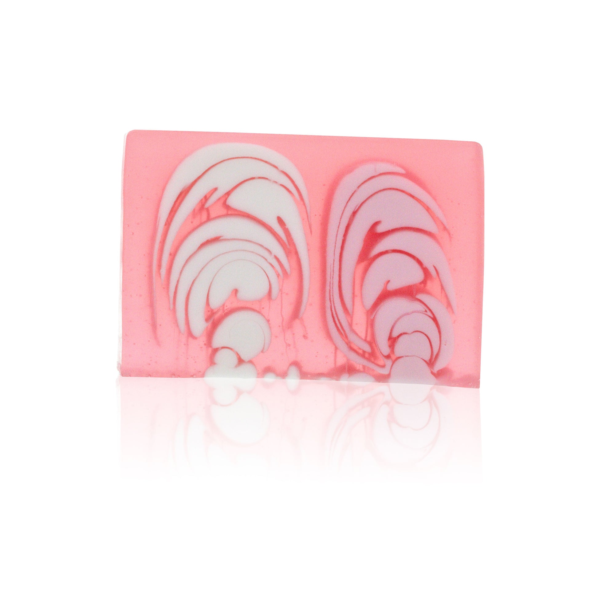 A large 1.2kg handcrafted rose soap loaf with a textured pink surface and delicate floral fragrance.
