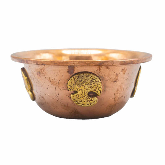 Handcrafted copper ritual bowl with an embossed Tree of Life design, measuring 12cm in diameter.